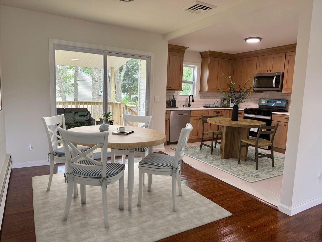 Dining room, Interior, Kitchen, Recessed Lighting, Stainless Steel Appliances, Wood Texture Flooring