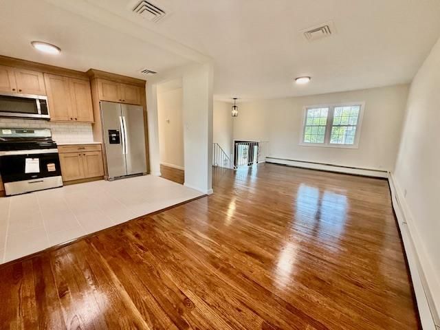 Empty room, Interior, Kitchen, Stainless Steel Appliances, Wood Texture Flooring