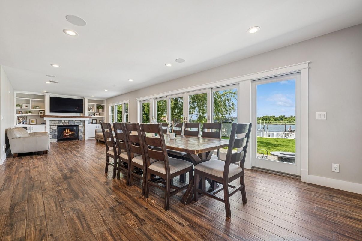 Dining room, Fireplace, Interior, Living room, Recessed Lighting, Wood Texture Flooring
