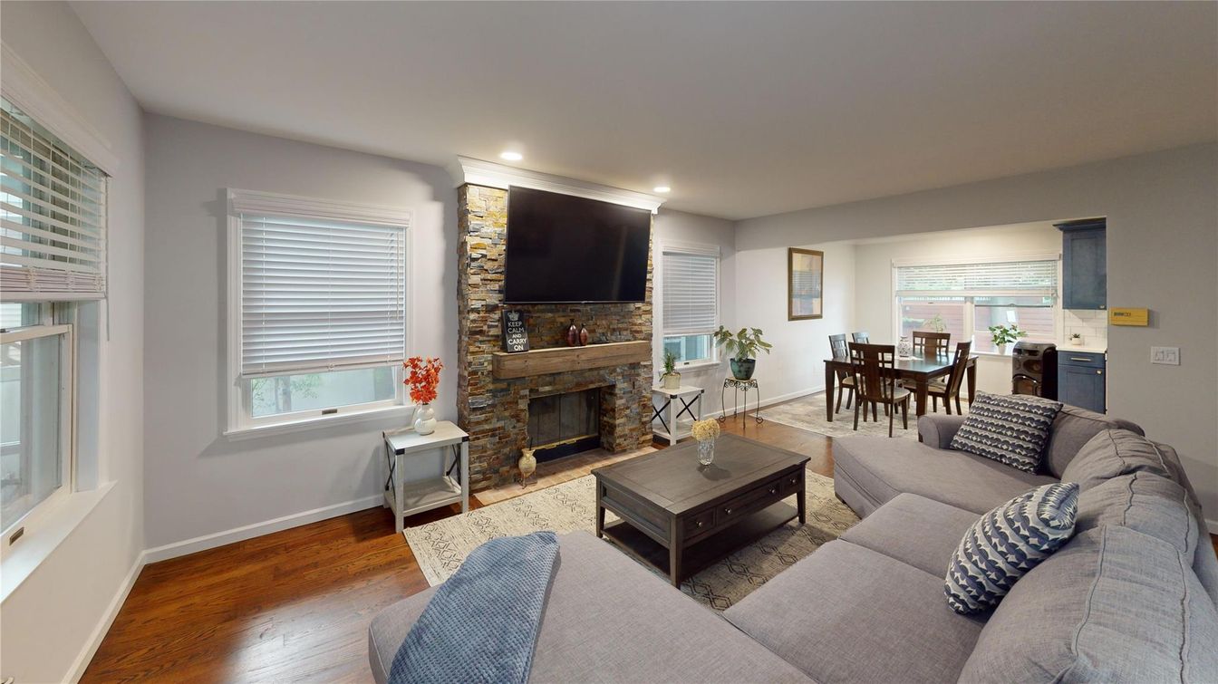 Dining room, Fireplace, Interior, Living room, Recessed Lighting, Wood Texture Flooring