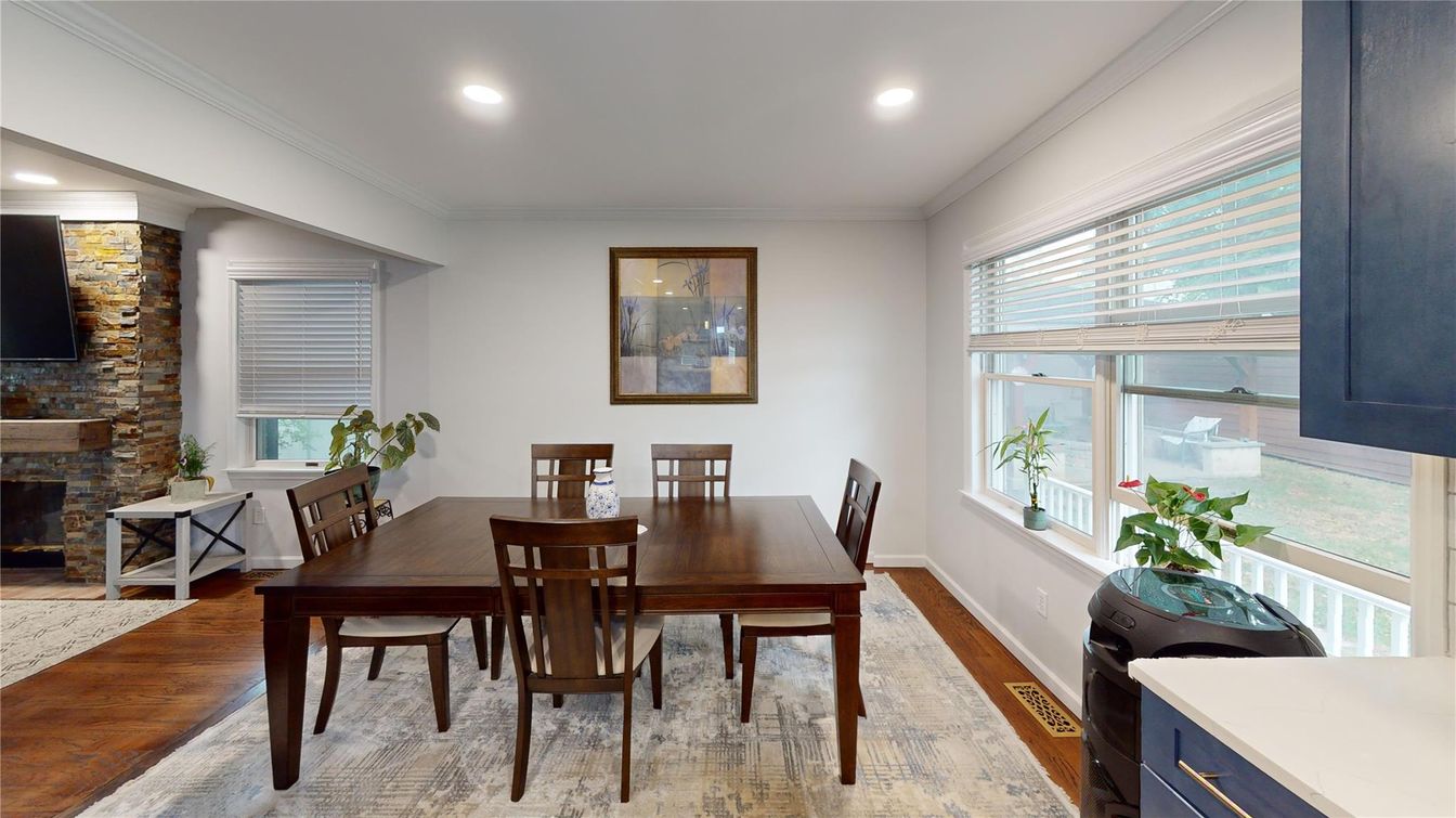 Dining room, Fireplace, Interior, Recessed Lighting, Stone Walls, Wood Texture Flooring