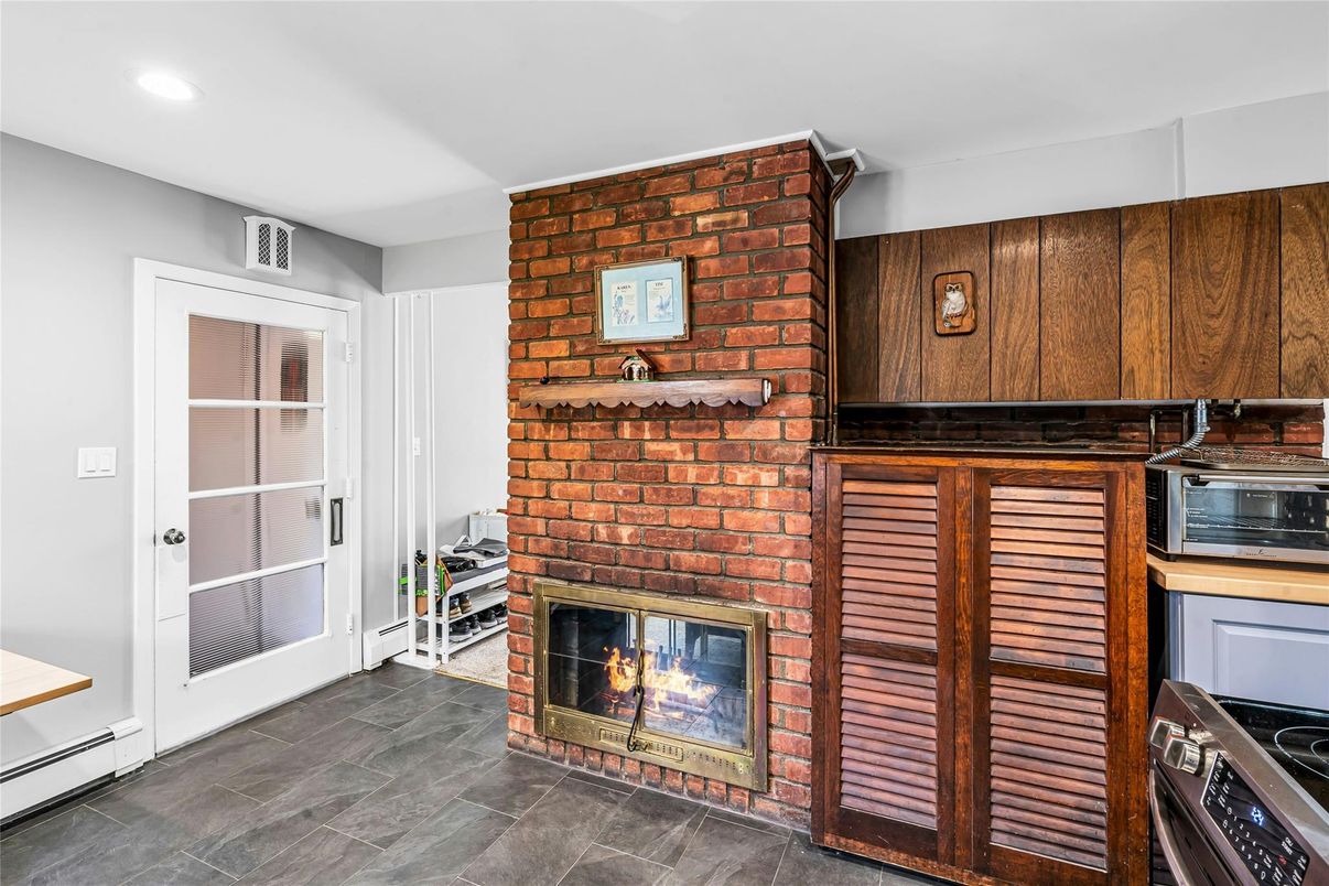 Fireplace, Interior, Kitchen, Recessed Lighting, Stone Walls