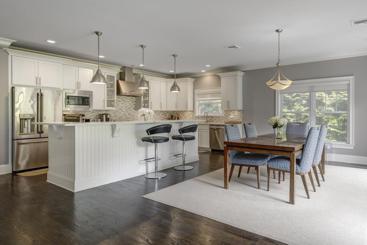Dining room, Interior, Kitchen, Pendant Lights, Recessed Lighting, Stainless Steel Appliances, Wood Texture Flooring