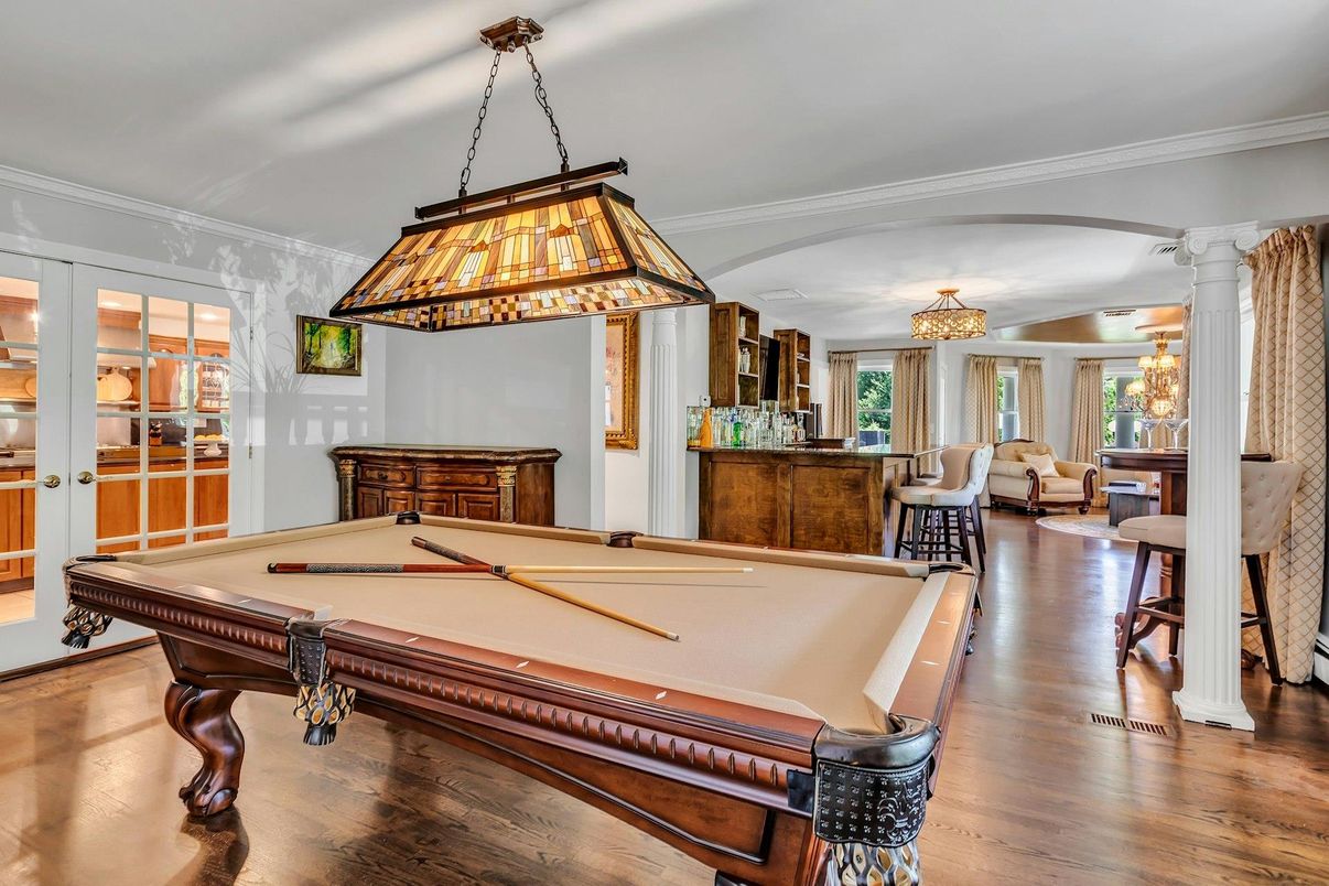 Billiard Table, Chandelier, Game Room, Interior, Living room, Pendant Lights, Wood Texture Flooring