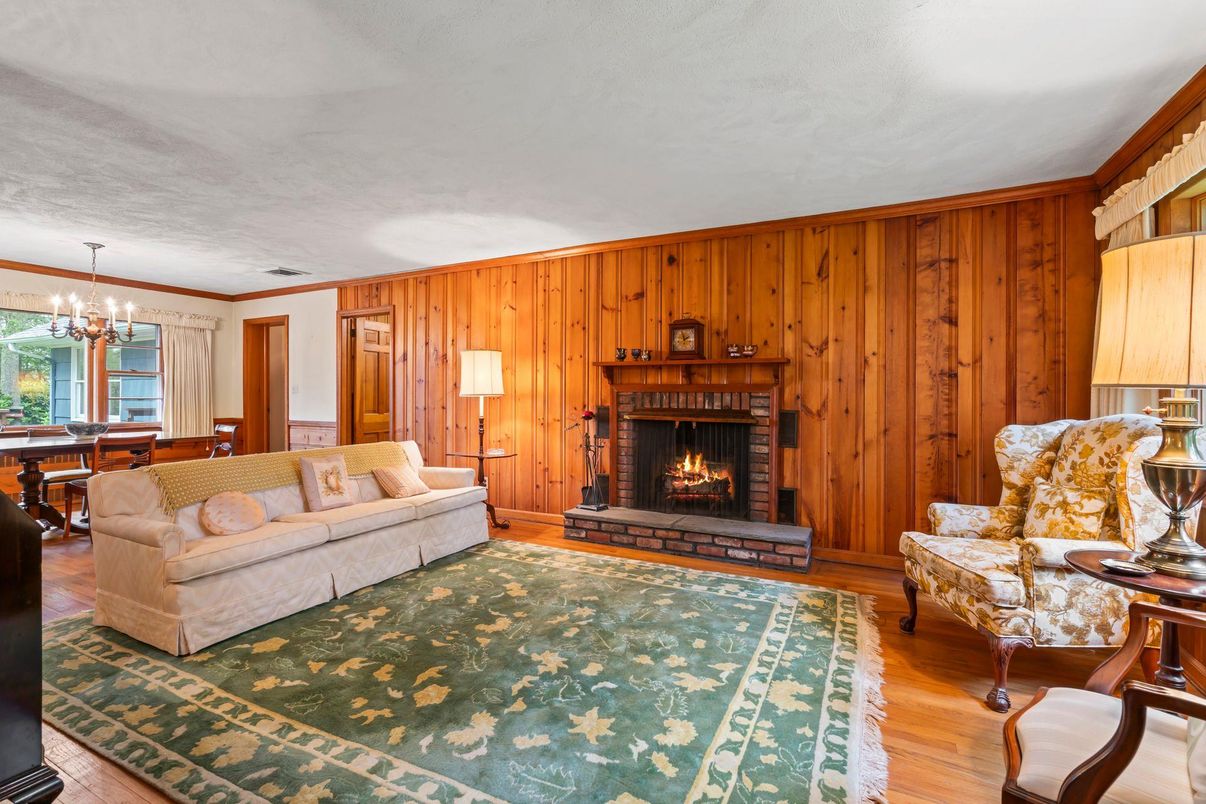Chandelier, Dining room, Fireplace, Interior, Living room, Wood Texture Flooring, Wooden Walls