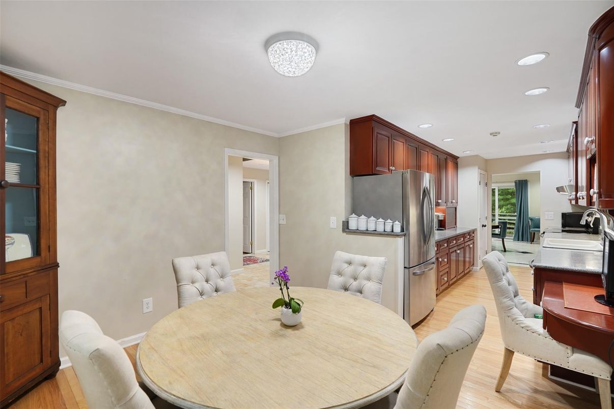 Dining room, Interior, Kitchen, Recessed Lighting, Stainless Steel Appliances, Wood Texture Flooring