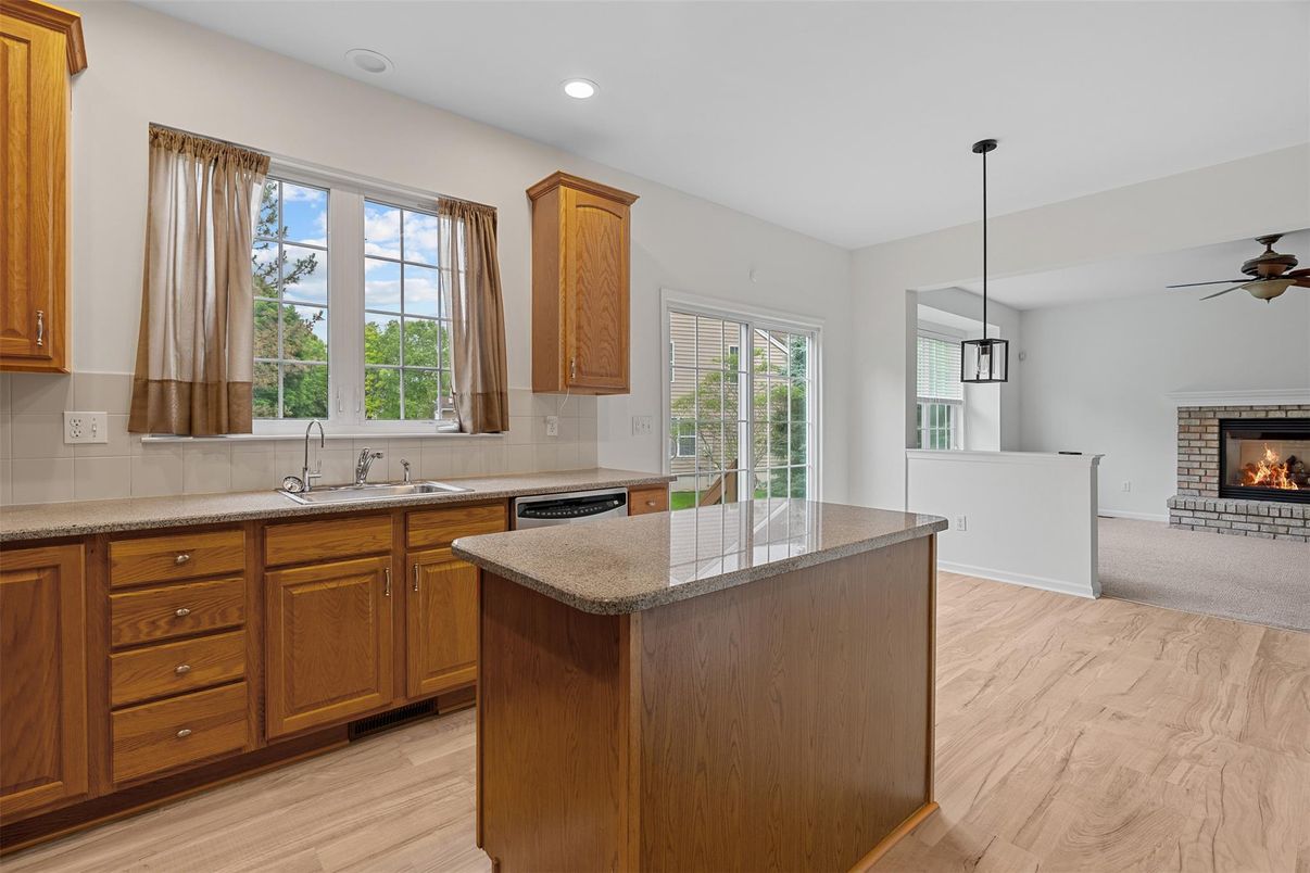 Fireplace, Interior, Kitchen, Pendant Lights, Recessed Lighting, Wood Texture Flooring