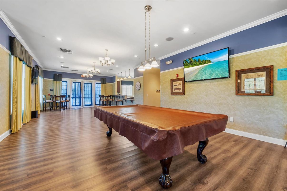 Billiard Table, Chandelier, Game Room, Interior, Pendant Lights, Recessed Lighting, Wood Texture Flooring