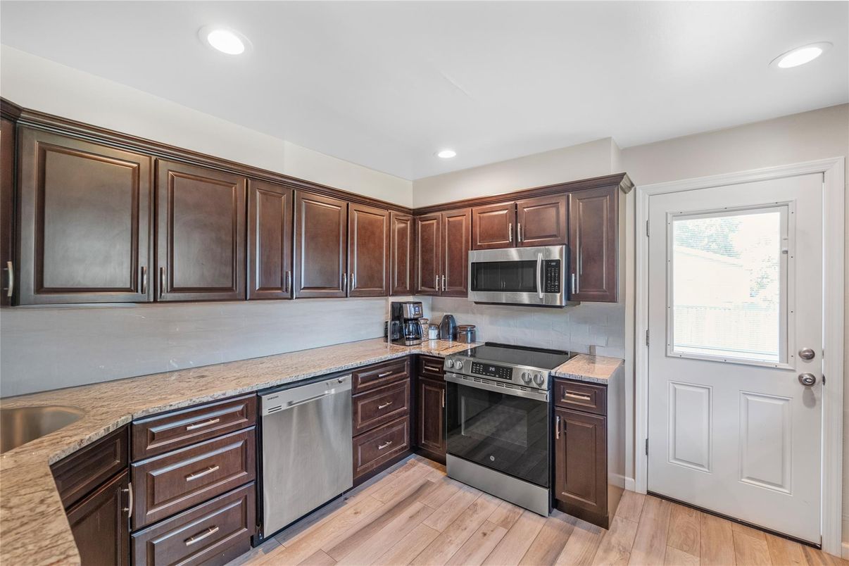 Interior, Kitchen, Recessed Lighting, Stainless Steel Appliances, Wood Texture Flooring
