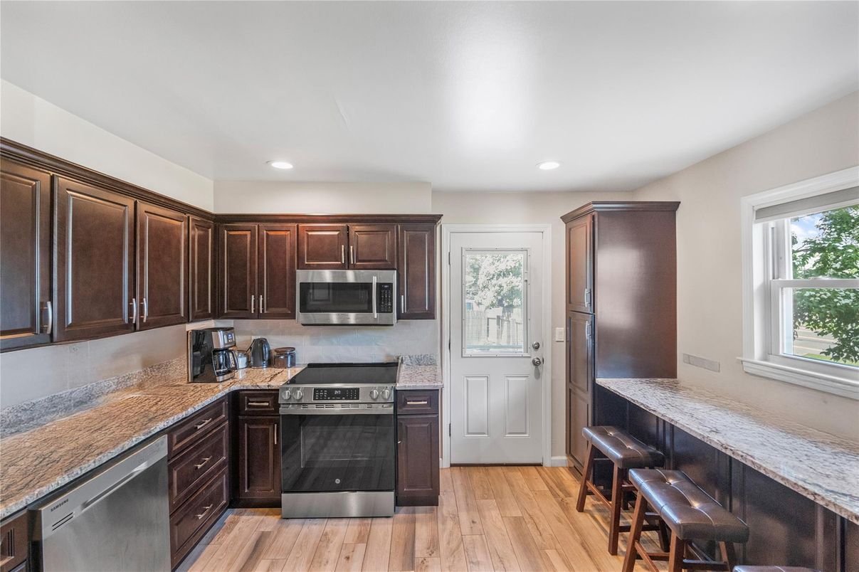 Interior, Kitchen, Recessed Lighting, Stainless Steel Appliances, Wood Texture Flooring