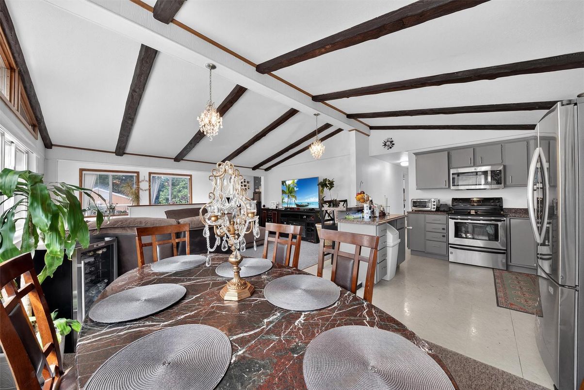 Chandelier, Dining room, Interior, Kitchen, Pendant Lights, Stainless Steel Appliances, Wooden Beams