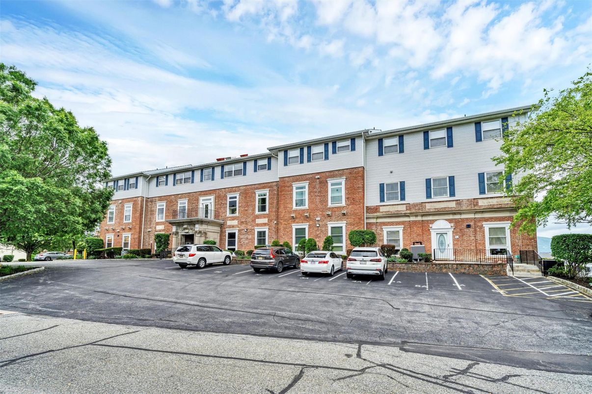Exterior, Facade, Brick Facade, Condo Building