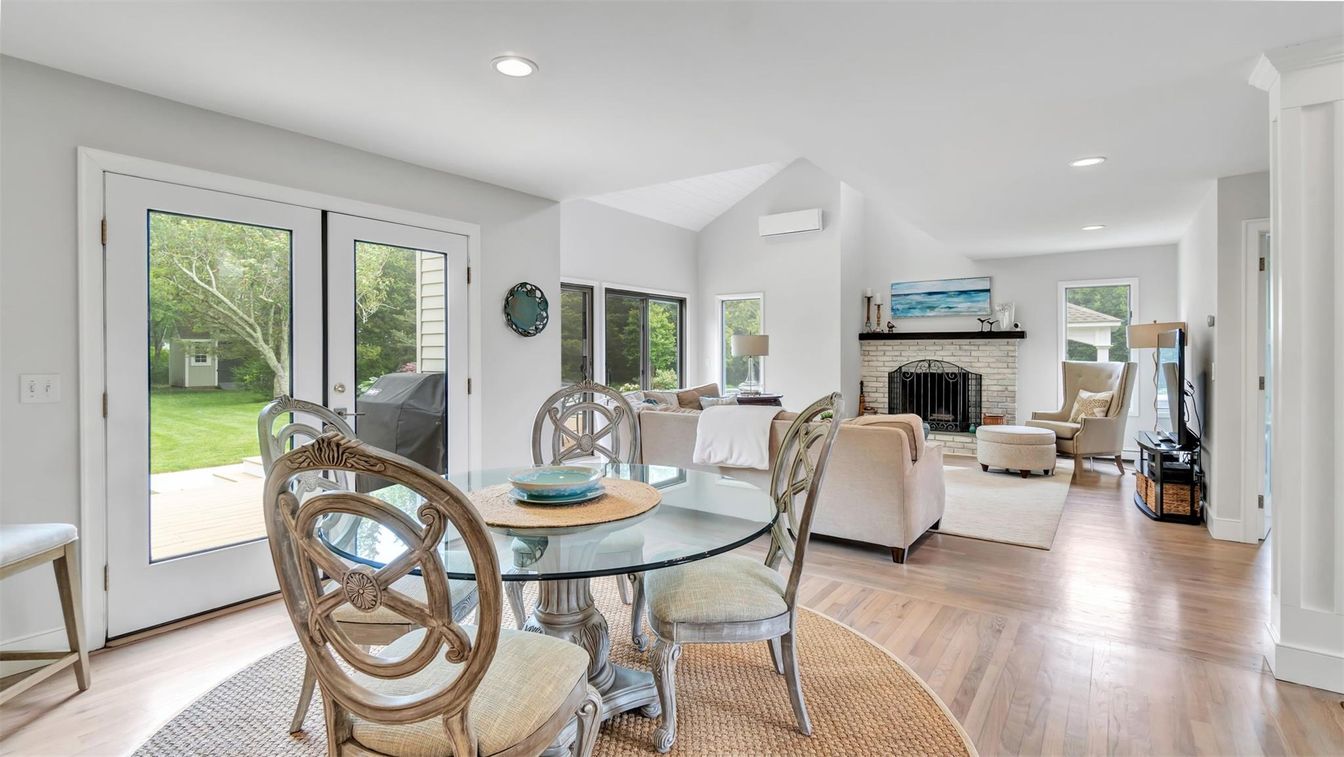 Dining room, Fireplace, Interior, Living room, Recessed Lighting, Wood Texture Flooring