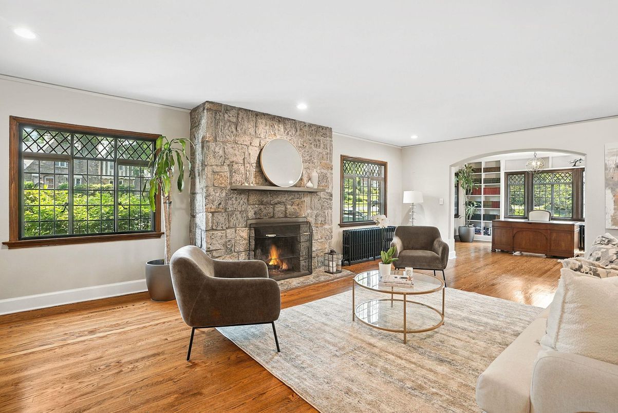 Fireplace, Interior, Living room, Recessed Lighting, Stone Walls, Wood Texture Flooring
