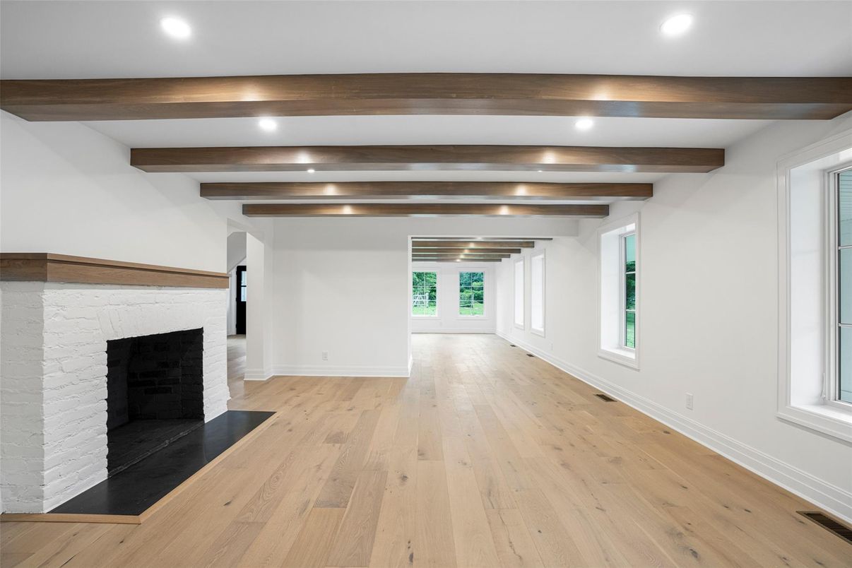 Empty room, Fireplace, Interior, Recessed Lighting, Wooden Beams, Wood Texture Flooring