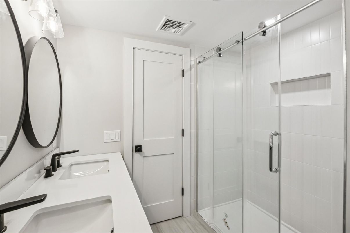 Bathroom, Dual Sink Vanities, Glass Shower, Interior, Wood Texture Flooring