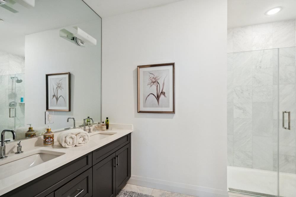 Bathroom, Dual Sink Vanities, Glass Shower, Interior, Marble Walls, Recessed Lighting