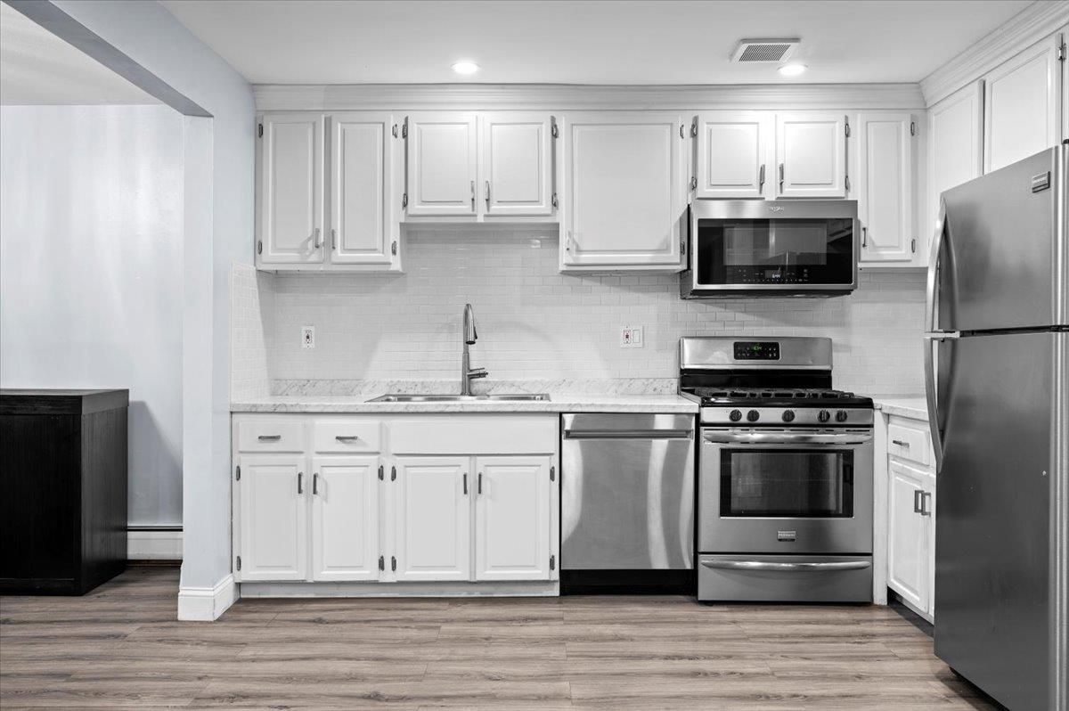 Interior, Kitchen, Recessed Lighting, Stainless Steel Appliances, Wood Texture Flooring