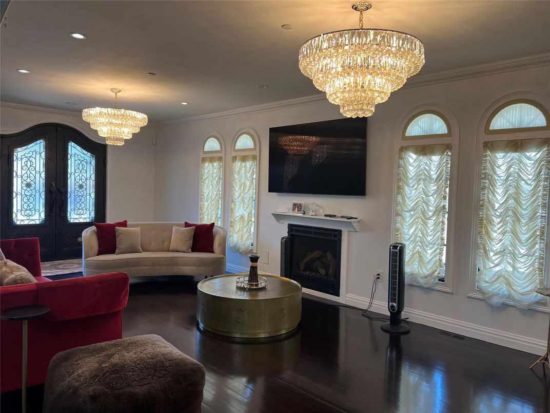 Chandelier, Fireplace, Interior, Living room, Recessed Lighting, Wood Texture Flooring