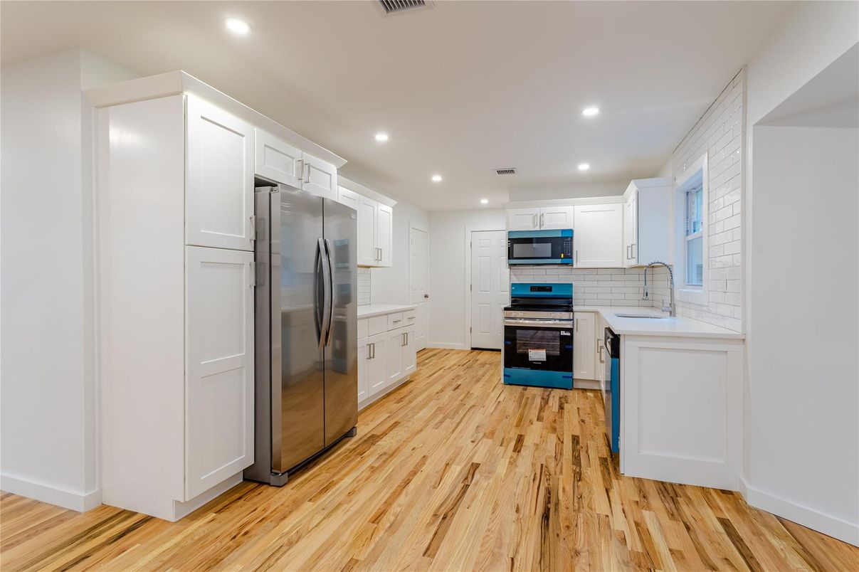 Interior, Kitchen, Recessed Lighting, Stainless Steel Appliances, Wood Texture Flooring