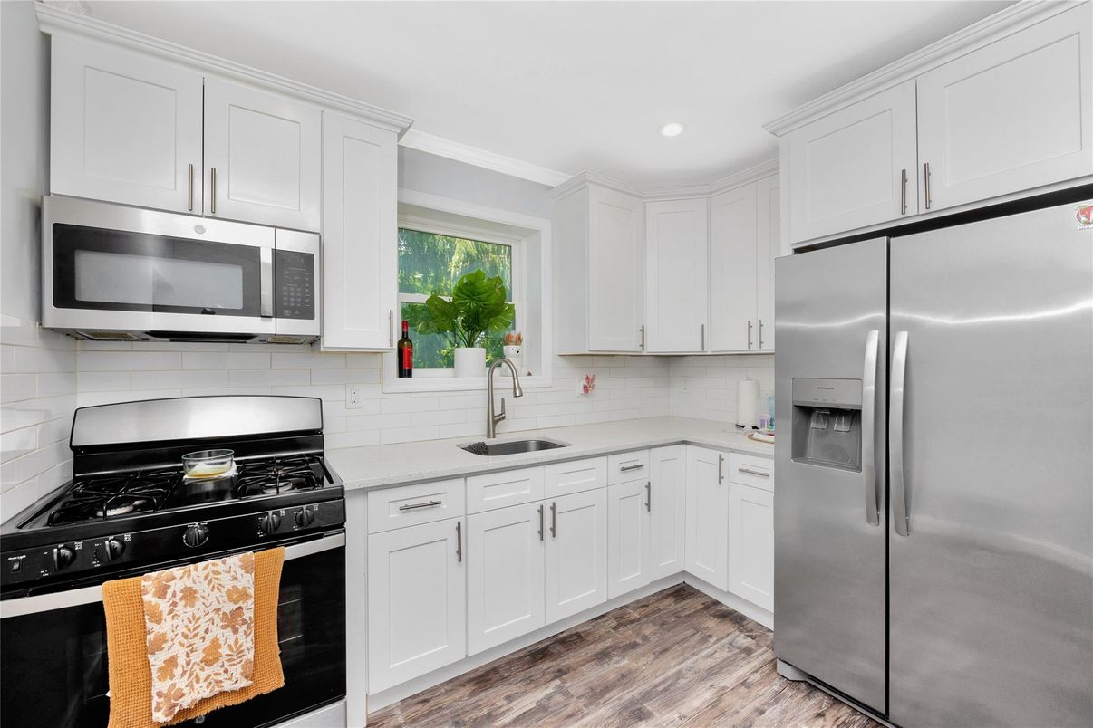 Interior, Kitchen, Recessed Lighting, Stainless Steel Appliances, Wood Texture Flooring