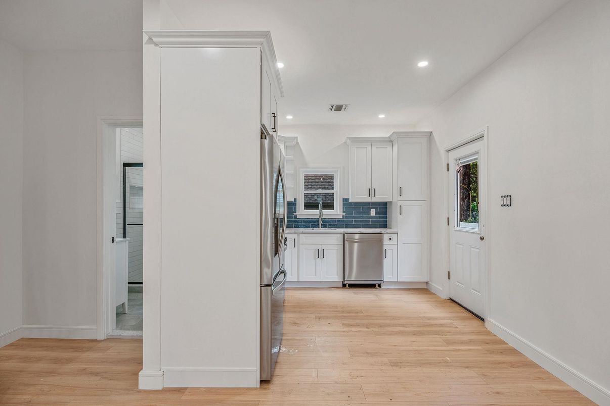 Interior, Kitchen, Recessed Lighting, Stainless Steel Appliances, Wood Texture Flooring