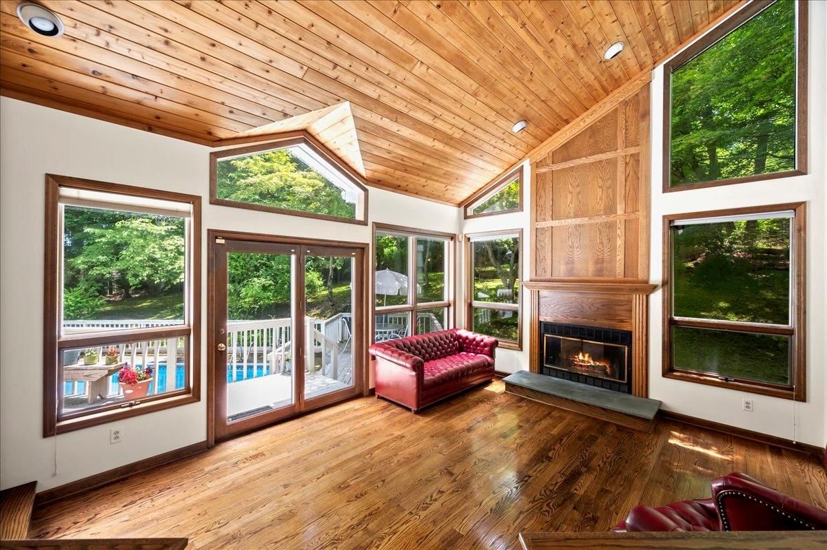 Fireplace, Interior, Recessed Lighting, Sun Room, Wooden Ceilings, Wood Texture Flooring