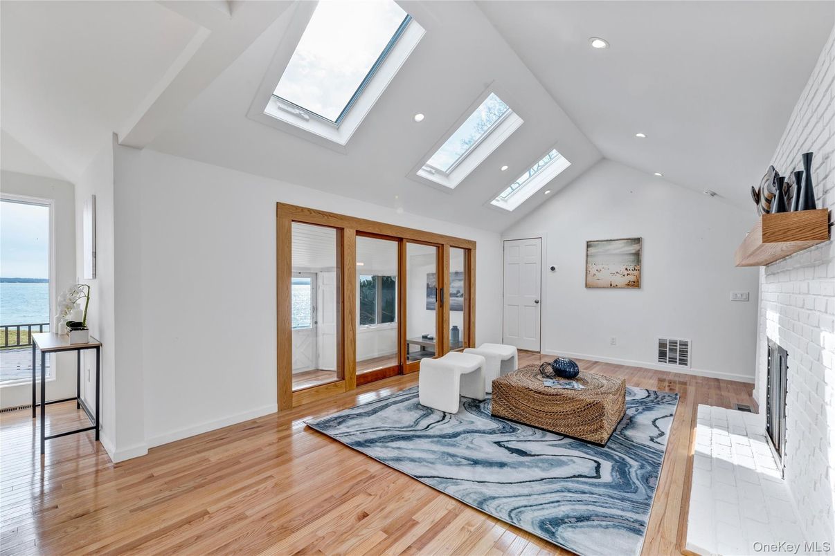 Fireplace, Interior, Recessed Lighting, Water, Wood Texture Flooring
