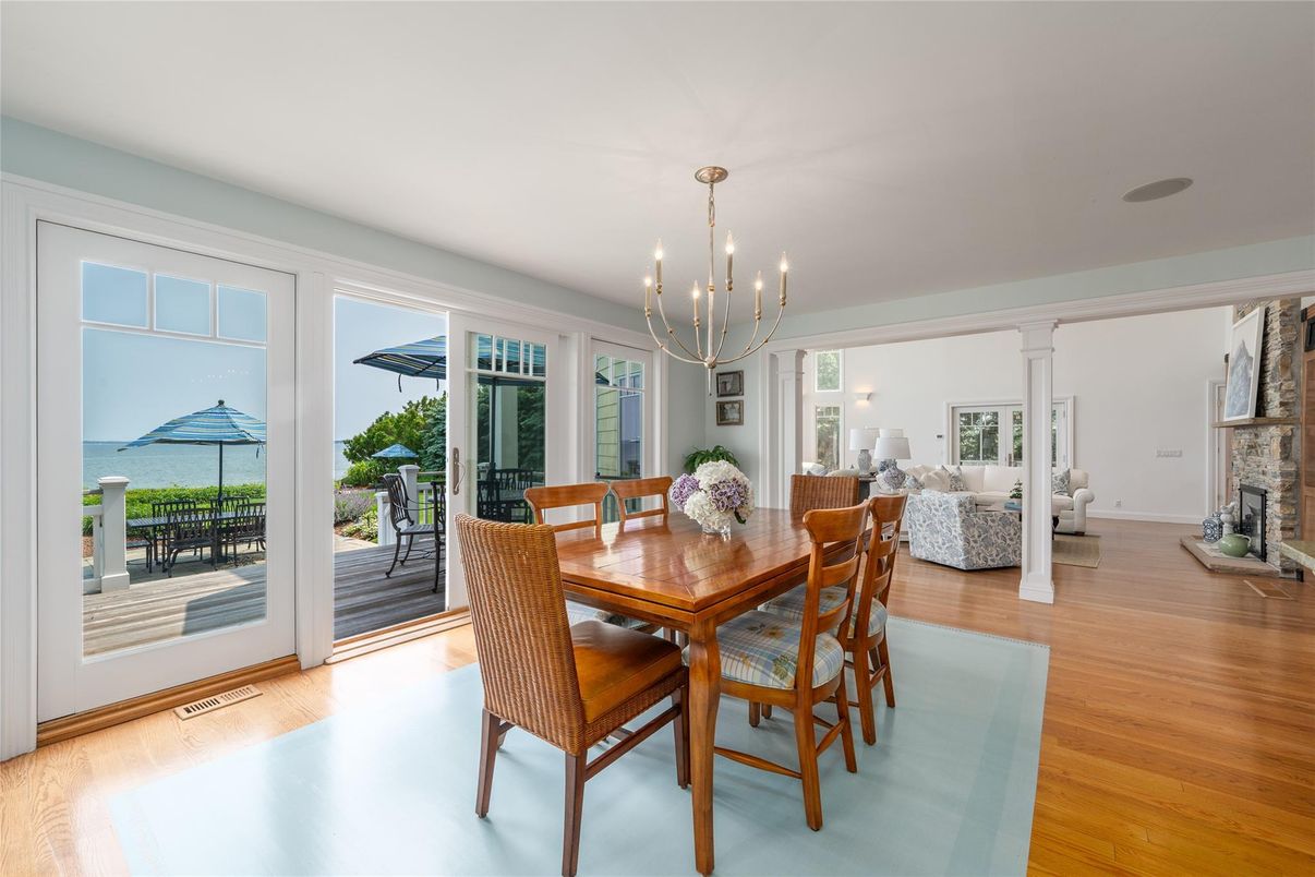 Chandelier, Dining room, Fireplace, Interior, Living room, Pendant Lights, Water, Wood Texture Flooring