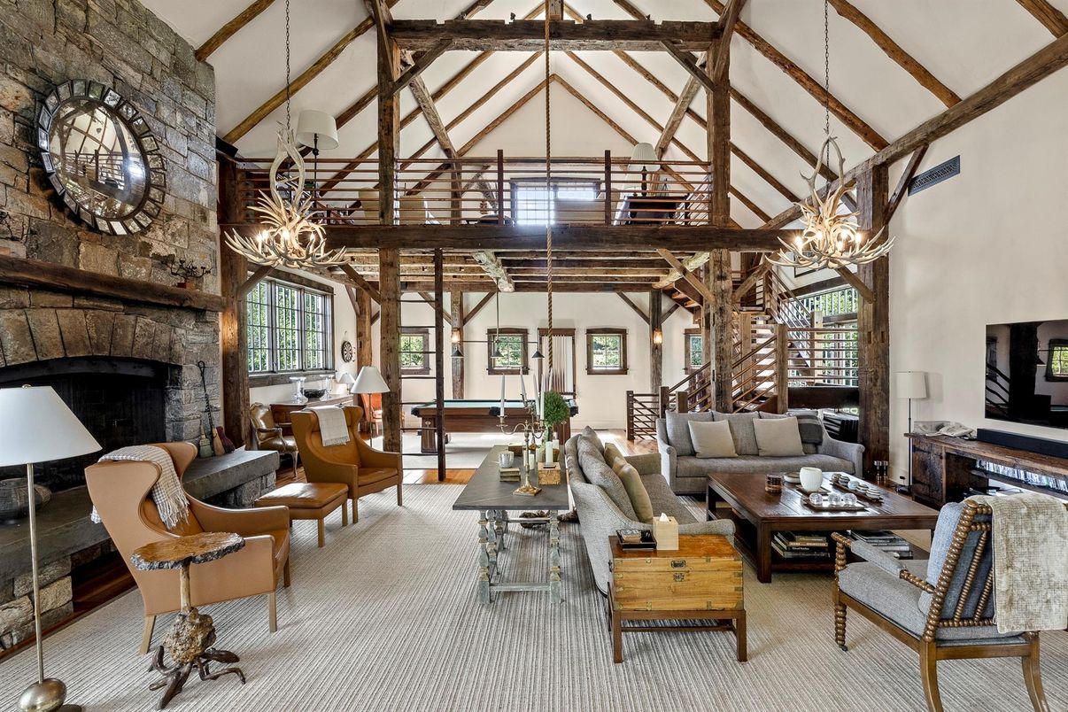 Chandelier, Fireplace, Interior, Living room, Pendant Lights, Stone Walls, Wooden Beams