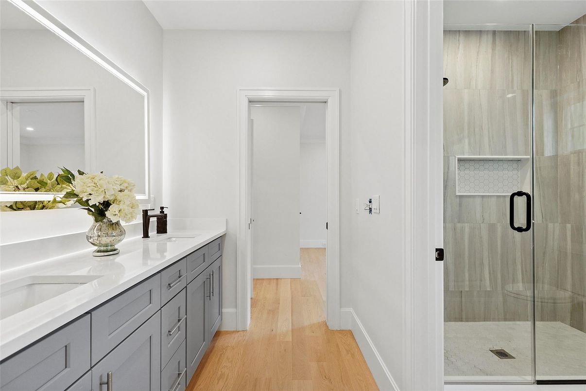 Bathroom, Dual Sink Vanities, Glass Shower, Interior, Wood Texture Flooring