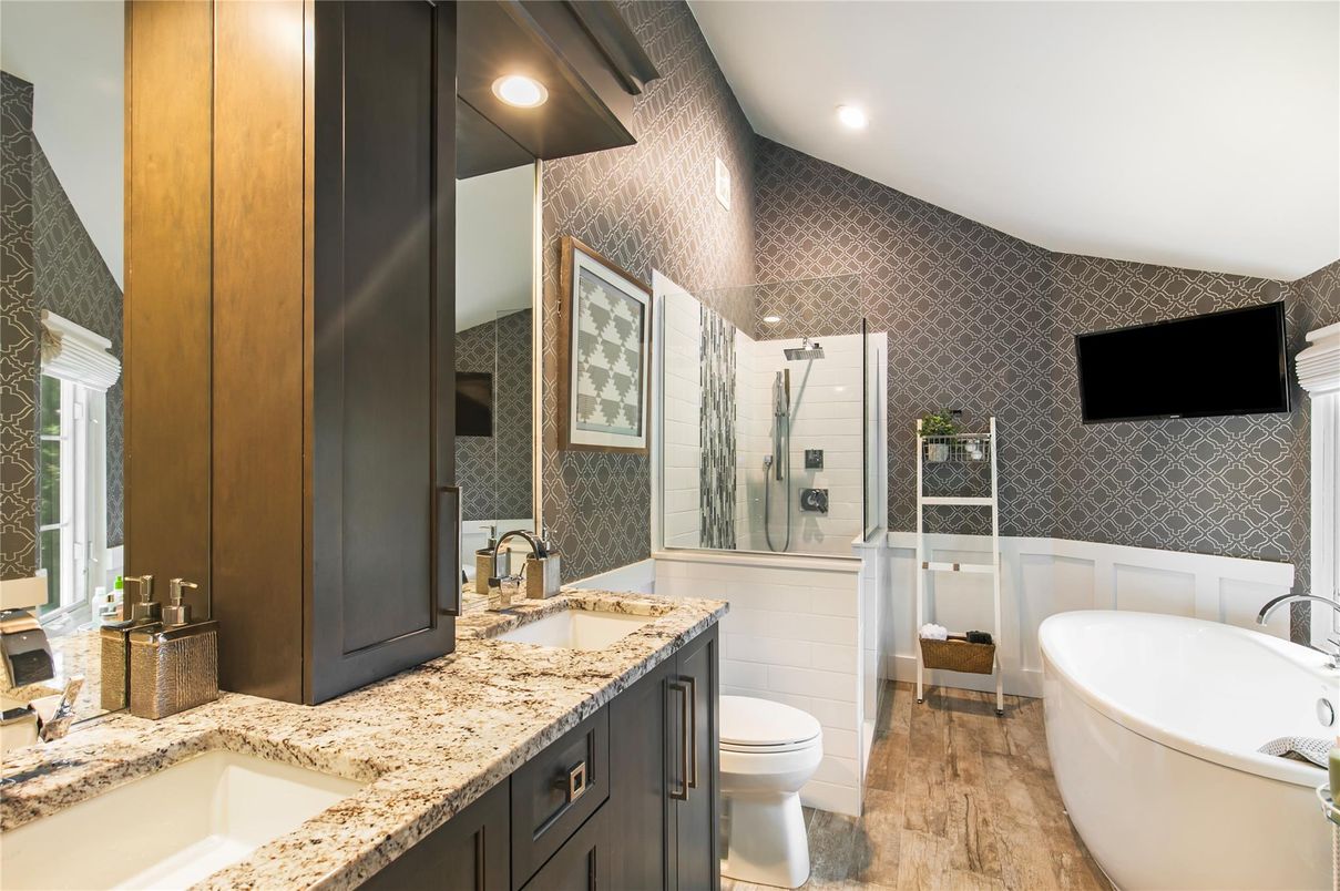 Bathroom, Dual Sink Vanities, Free Standing Baths, Glass Shower, Interior, Recessed Lighting, Wood Texture Flooring