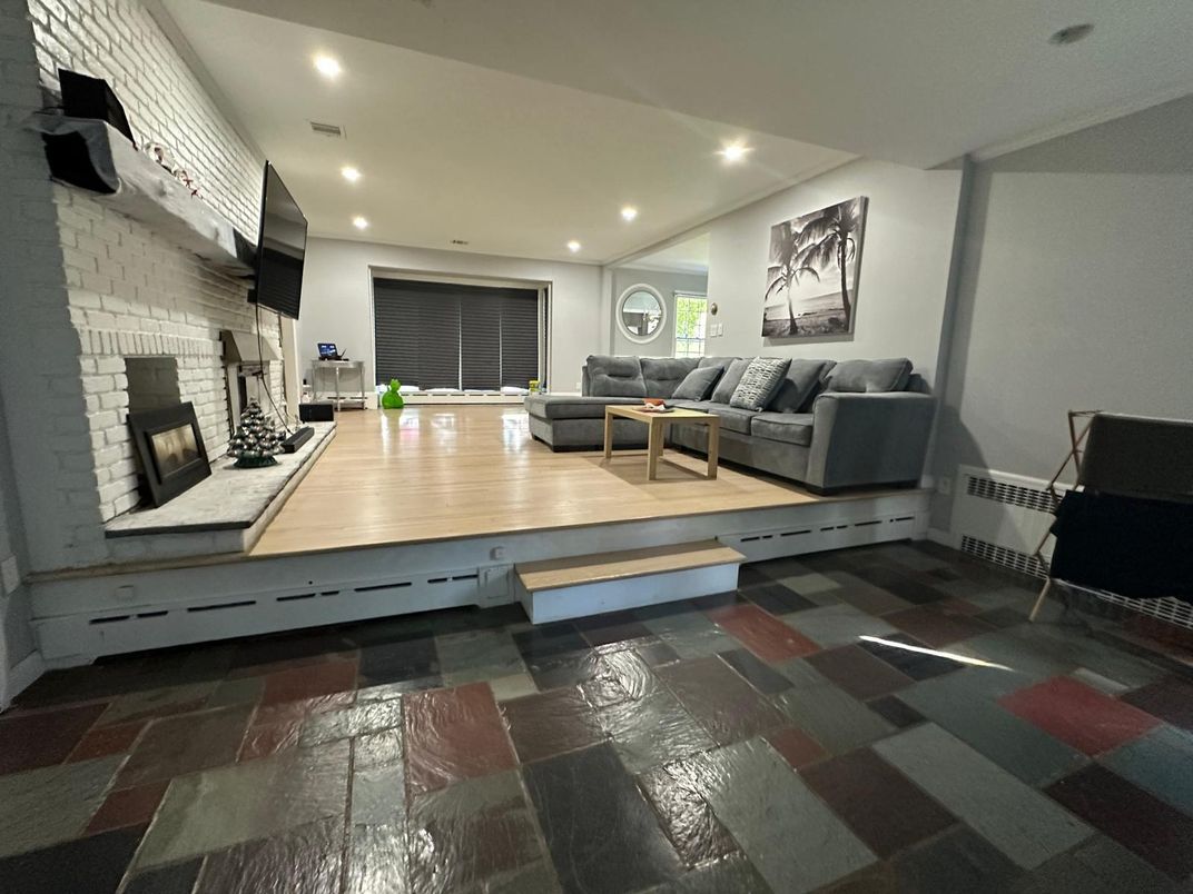 Fireplace, Interior, Living room, Recessed Lighting, Stone Walls, Wood Texture Flooring