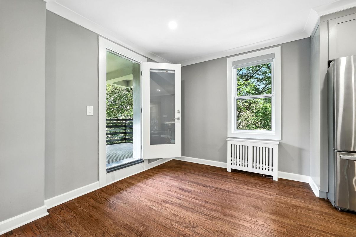 Empty room, Interior, Kitchen, Recessed Lighting, Stainless Steel Appliances, Wood Texture Flooring