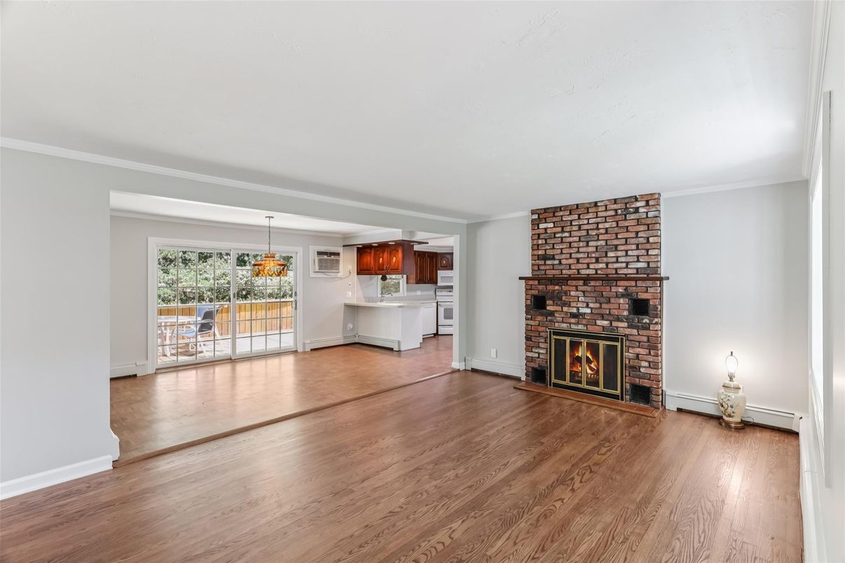 Empty room, Fireplace, Interior, Kitchen, Pendant Lights, Stone Walls, Wood Texture Flooring