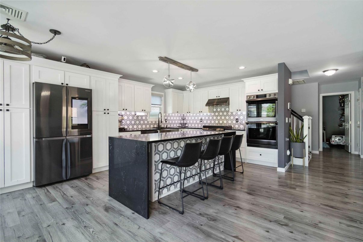 Interior, Kitchen, Pendant Lights, Recessed Lighting, Stainless Steel Appliances, Wood Texture Flooring