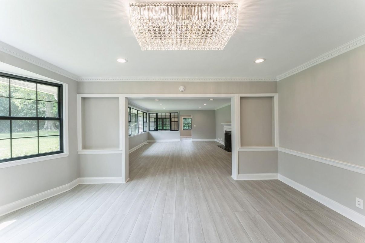 Chandelier, Empty room, Fireplace, Interior, Recessed Lighting, Wood Texture Flooring