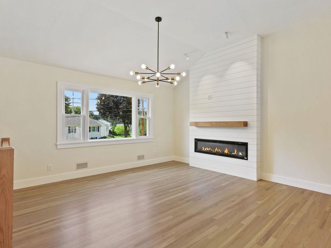 Empty room, Fireplace, Interior, Pendant Lights, Wood Texture Flooring