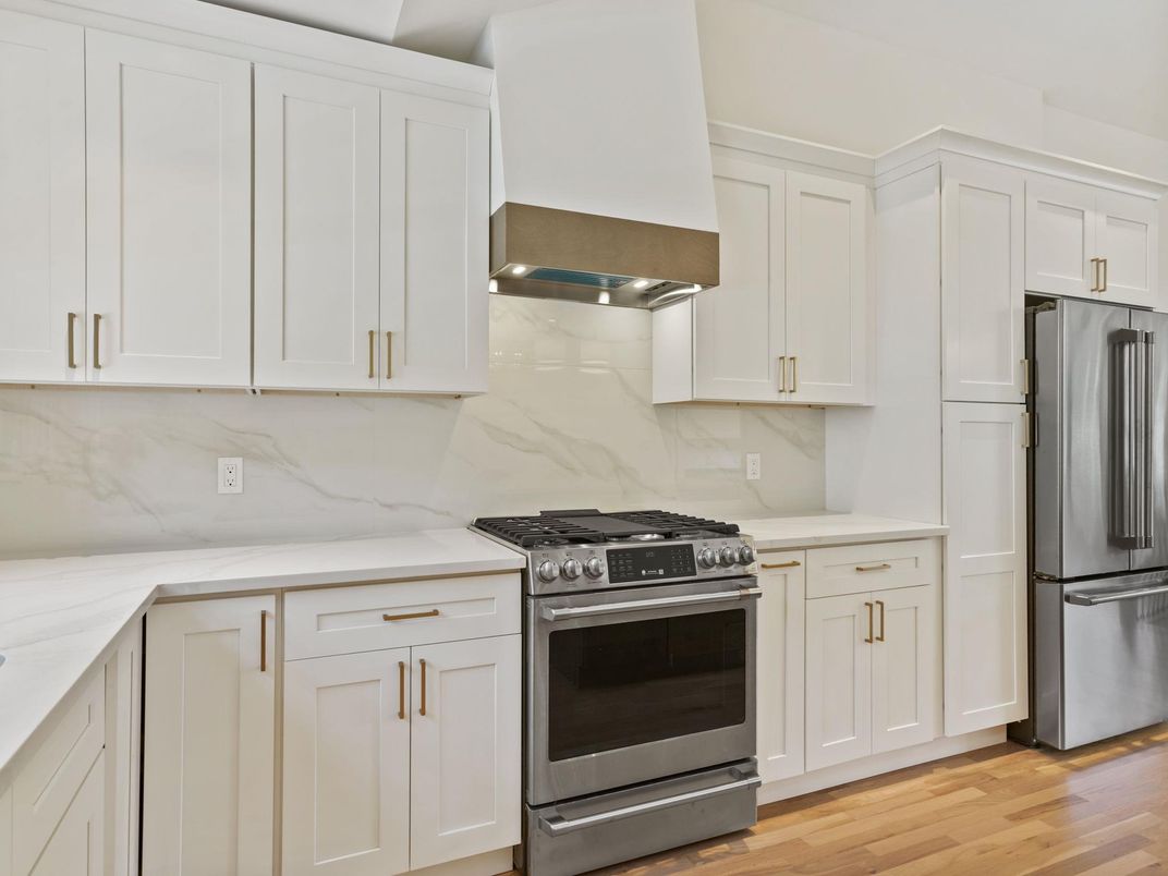 Interior, Kitchen, Marble Walls, Stainless Steel Appliances, Wood Texture Flooring