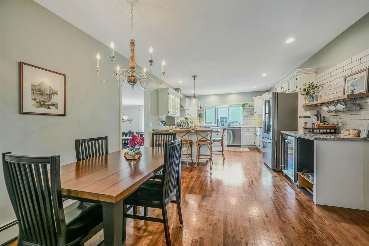 Chandelier, Dining room, Interior, Kitchen, Pendant Lights, Recessed Lighting, Stainless Steel Appliances, Wood Texture Flooring