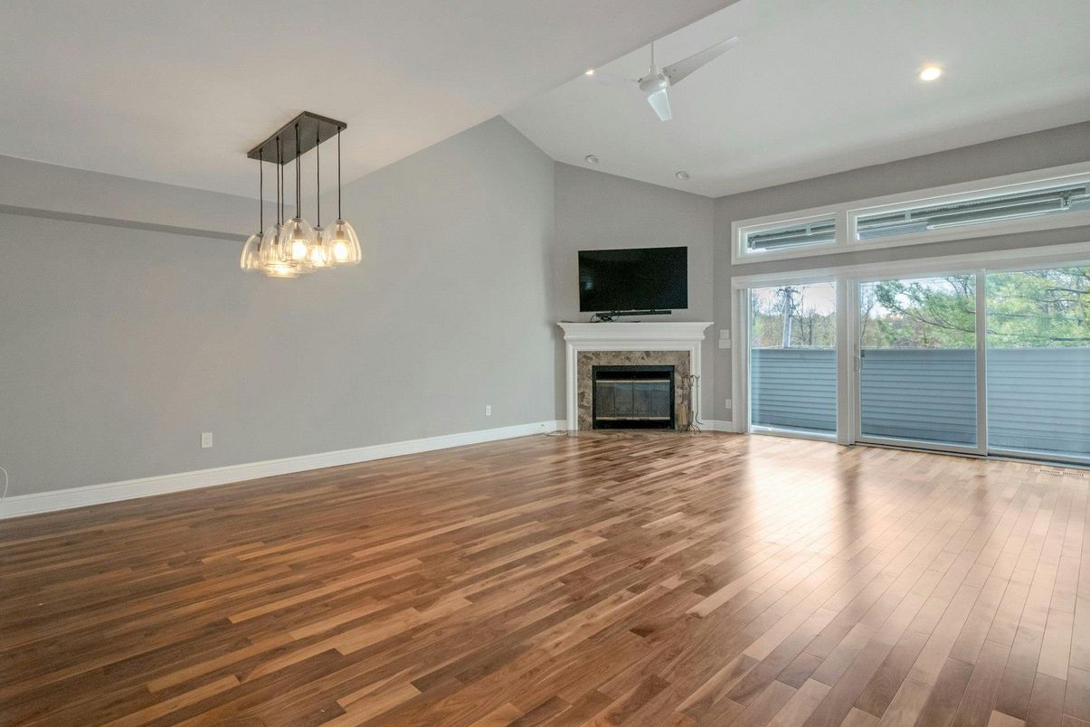 Empty room, Fireplace, Interior, Pendant Lights, Recessed Lighting, Wood Texture Flooring