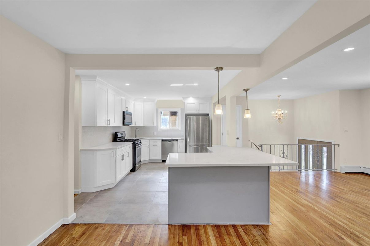 Chandelier, Interior, Kitchen, Pendant Lights, Recessed Lighting, Stainless Steel Appliances, Wood Texture Flooring