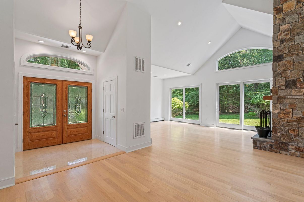 Chandelier, Empty room, Fireplace, Interior, Recessed Lighting, Wood Texture Flooring