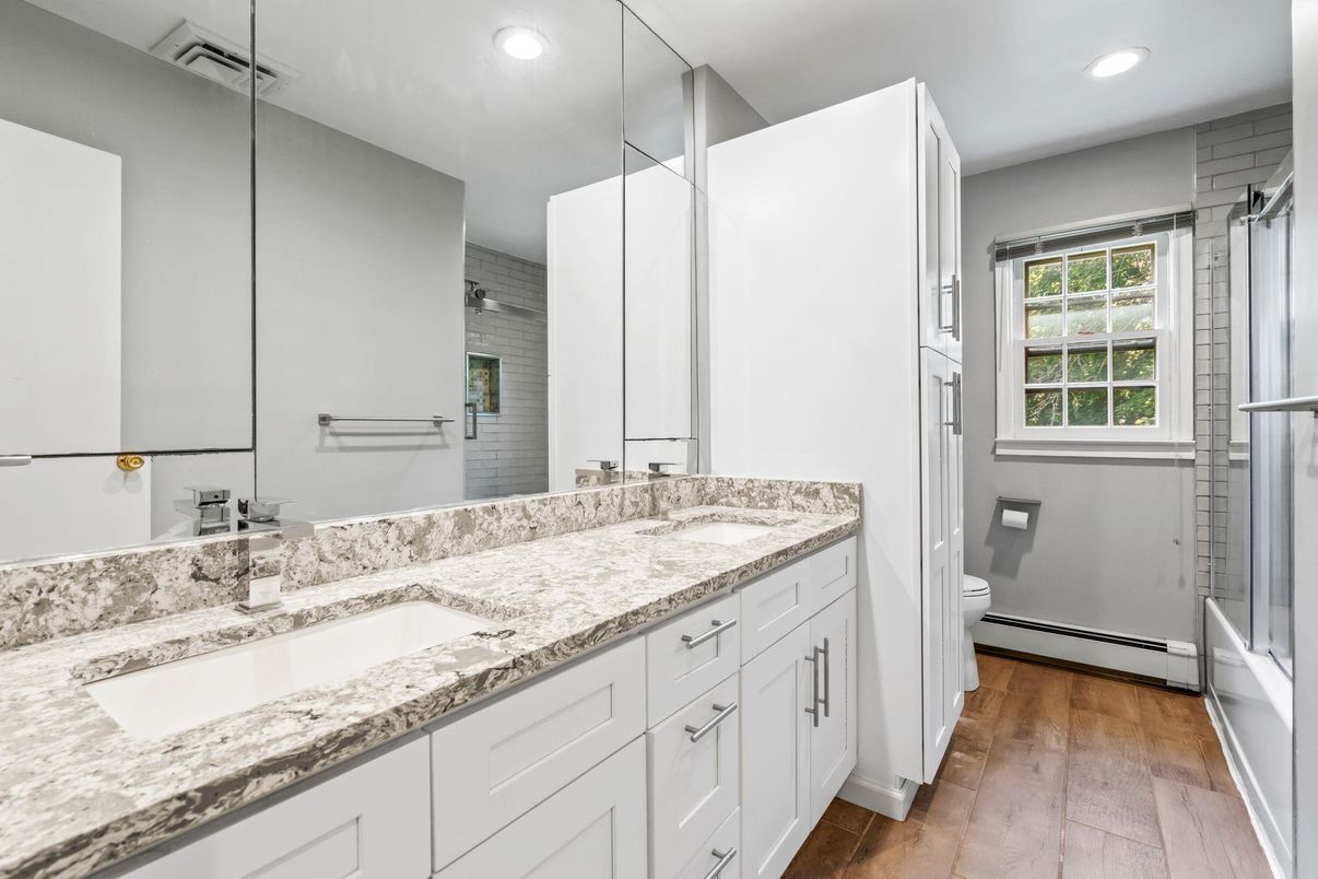 Bathroom, Dual Sink Vanities, Interior, Recessed Lighting, Wood Texture Flooring
