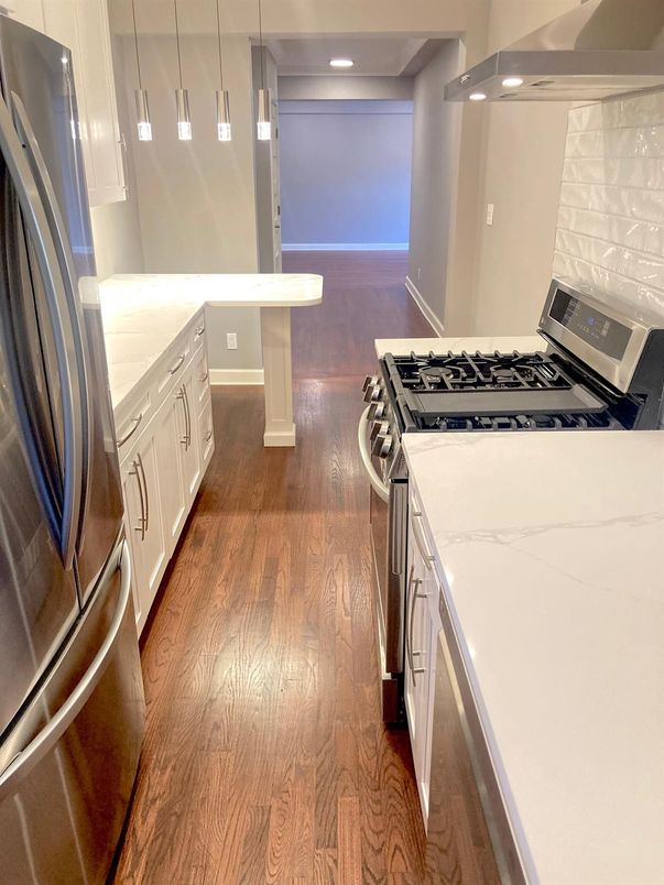 Interior, Kitchen, Pendant Lights, Recessed Lighting, Stainless Steel Appliances, Wood Texture Flooring