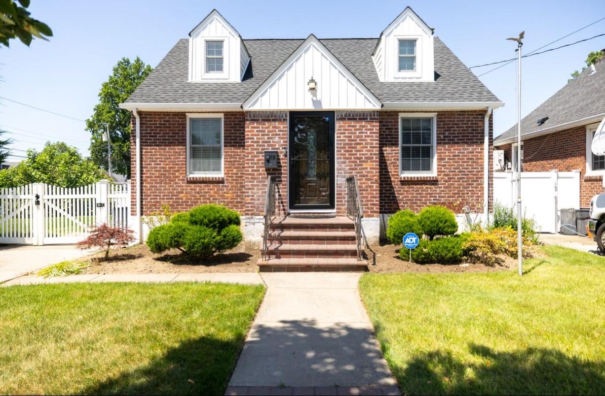 Exterior, Facade, Brick Facade, Cape Cod