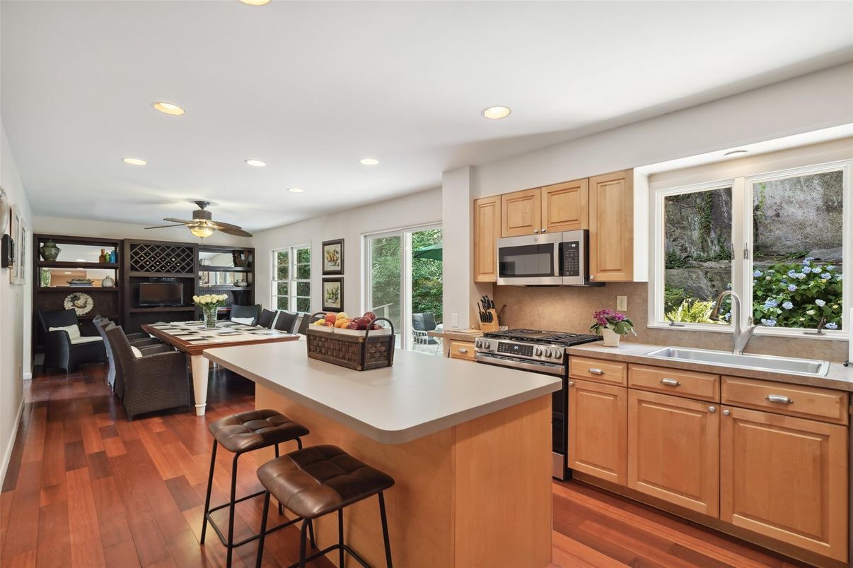 Dining room, Interior, Kitchen, Living room, Recessed Lighting, Stainless Steel Appliances, Wood Texture Flooring