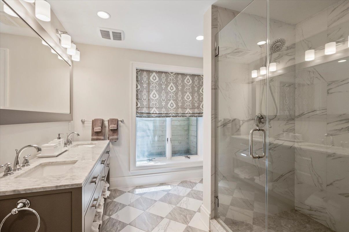 Bathroom, Dual Sink Vanities, Glass Shower, Interior, Marble Walls, Recessed Lighting