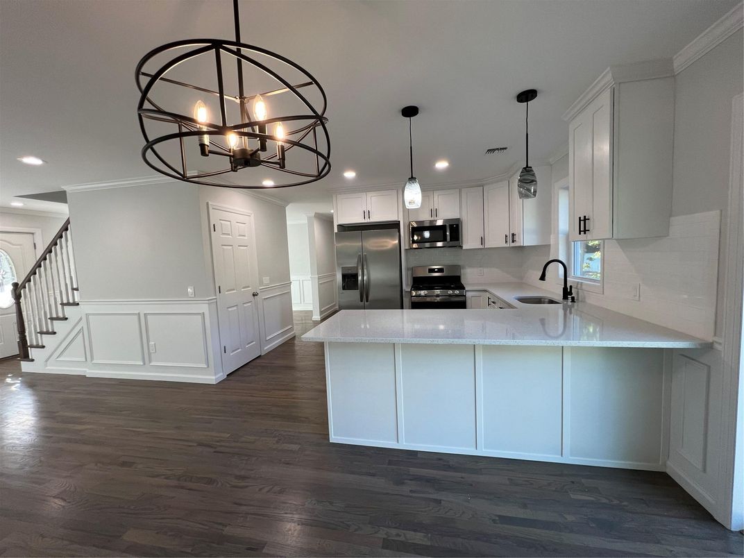 Chandelier, Interior, Kitchen, Pendant Lights, Recessed Lighting, Stainless Steel Appliances, Wood Texture Flooring