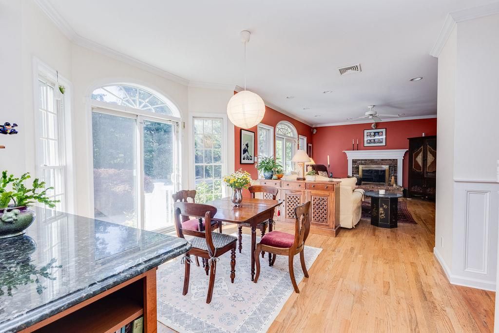 Dining room, Fireplace, Interior, Living room, Pendant Lights, Recessed Lighting, Wood Texture Flooring